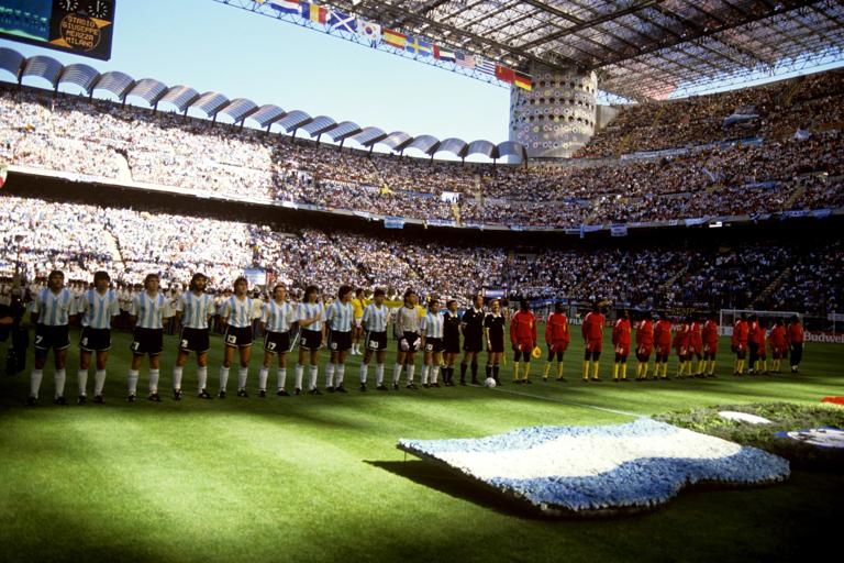 Argentina (l) and Cameroon (r) line up for the national anthems before kick off (Photo by Peter Robinson - PA Images via Getty Images)