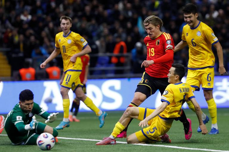 Kazakhstan's goalkeeper Temirlan Anarbekov, Belgium's forward Romeo Vermant and Kazakhstan's defender #05 Bagdat Kairov vie for the ball during the FIFA World Cup 2026 qualifiers Europe zone group J football match between Kazakhstan and Belgium at the Astana Arena in Astana on November 15, 2025. (Photo by STANISLAV FILIPPOV / AFP) (Photo by STANISLAV FILIPPOV/AFP via Getty Images)